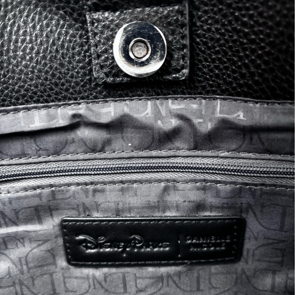 Danielle Nicole Disney It’s a Small World Black Tote with Colorful Patches - Picture 9 of 11